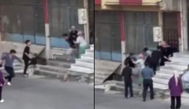Arnavutköy'de sokak ortasında kavga: Sopalarla binaya saldırdılar