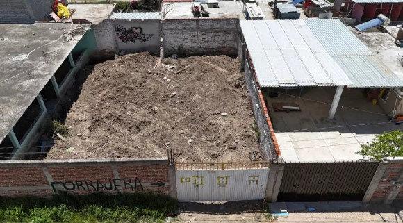 Meksika'nın Guanajuato eyaletinde 32 kişinin kalıntılarının toplu mezarda bulunduğu mülkün havadan görünümü