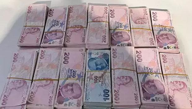 Yapılan arama sonucunda ele geçirilen 310 bin TL nakit para