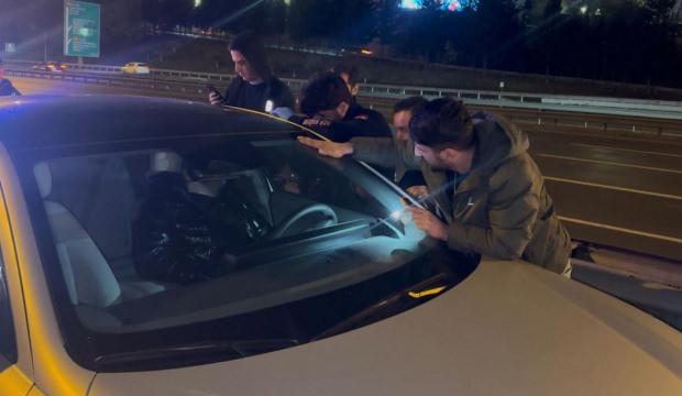 Aracını TEM'in ortasına çekip uykuya daldı! Camı baltayla kırıldı