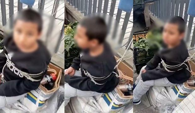 Pazar ortasında çocuğu iple bağladı! İşte gerekçesi...