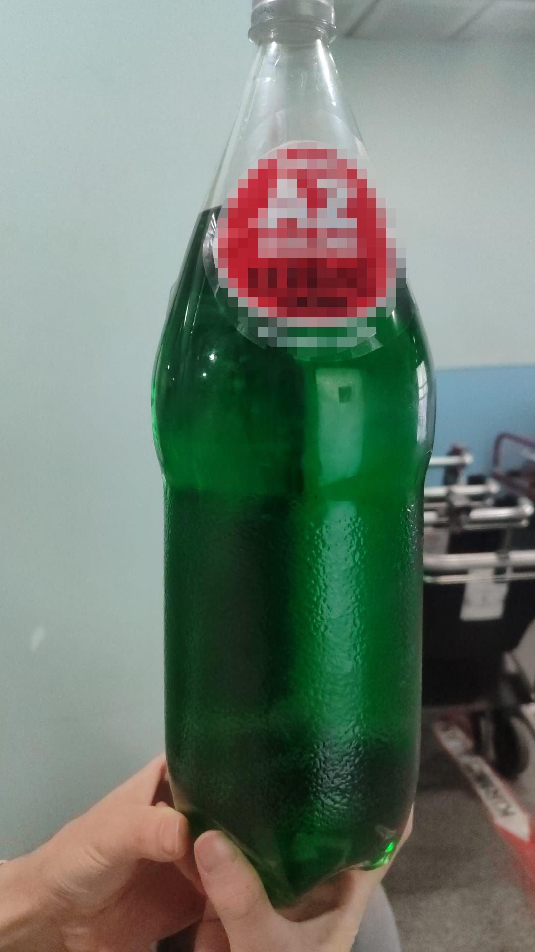 İçerisinde antifriz bulunan gazoz şişesi. 