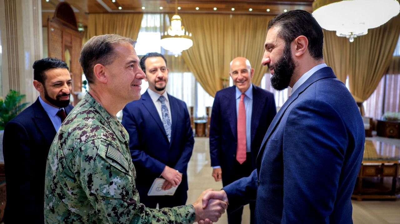 Ahmed Şara ve Brad Cooper