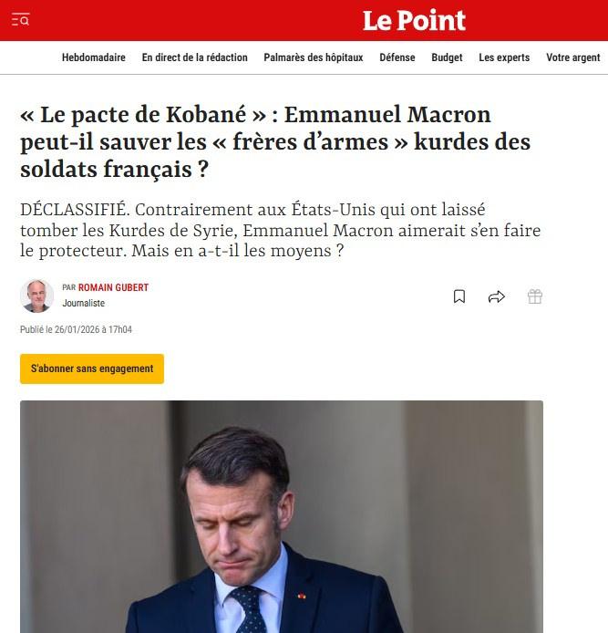 İlgili haberin ekran görüntüsü. Çeviri: 'Kobani Paktı': Emmanuel Macron, Fransız askerlerinin Kürt 'silah arkadaşlarını' kurtarabilecek mi? GİZLİLİĞİ KALDIRILDI. Suriye Kürtlerini terk eden Amerika Birleşik Devletleri'nin aksine, Emmanuel Macron onların koruyucusu olmak istiyor. Ama bunu yapabilecek imkanlara sahip mi?