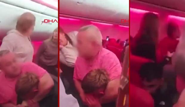 Antalya'dan kalktı Br&uuml;ksel Havalimanı'na acil iniş yaptı! 2 yolcunun kavga anları kamerada