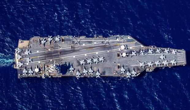 Sıcak saatler! D&uuml;nyanın en b&uuml;y&uuml;k savaş gemisi Girit'ten ayrıldı! 