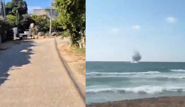 Hizbullah'ın attığı roketlerin denize d&uuml;şmesi plajdaki İsraillilerde korkuya neden oldu