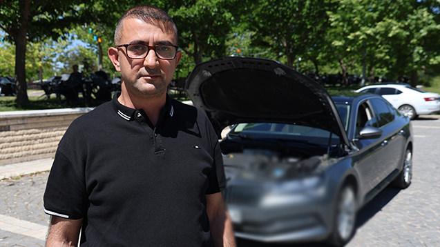 Tunay Akgül (44) ve satın aldığı araç.