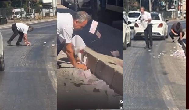 Para dolu &ccedil;uval patlayınca trafikte ilgin&ccedil; anlar ortaya &ccedil;ıktı