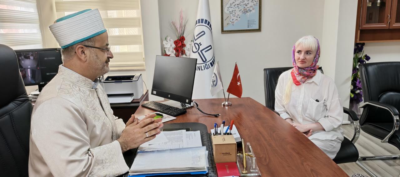 Ksenııa Lıtvınova (45) ve Müftü Mehmet Seri Doğru