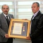 Bitlis'te Devlet Övünç Madalyaları sahiplerine verildi