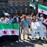 Hollanda'da Suriye gösterisi: Sayın insanlık neredesin?