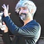 Manuş Baba'nın askerlik fotoğrafını g&ouml;renler şarkıcıyı tanıyamadı