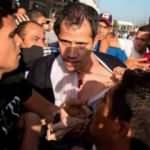 Venezuela halkı Guaido'yu 'hain, katil' diyerek havalimanında kovaladı