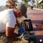 Kuşadası'nda kıyıya vuran dev kaplumbağa görenleri şaşkına çevirdi