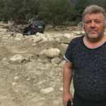 Ayancık'taki selde yaşlı ve engelli 3 komşusunu sırtında &ccedil;atıya &ccedil;ıkararak kurtardı