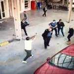 Polisin belindeki silahı alıp rastgele etrafa ateş etti