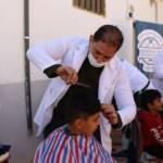 Türkiye'den giden gönüllü berberler İdlib'deki 110 yetimi tıraş etti