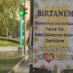 Kamyoncudan eşine ilginç pankart: Güzel gözlerine bakacak yüzüm yok, beni affet