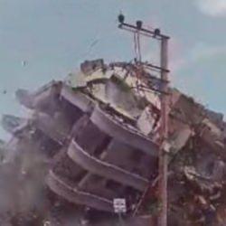 6 katlı bina iş makinesinin darbesiyle b&ouml;yle yerle bir oldu