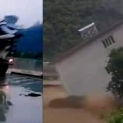 &Ccedil;in'de şiddetli yağış nedeniyle k&ouml;pr&uuml;n&uuml;n &ccedil;&ouml;kmesi sonucu 12 kişi &ouml;ld&uuml;