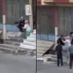 Arnavutköy'de sokak ortasında kavga: Sopalarla binaya saldırdılar