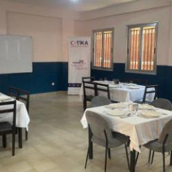 Gineli Bakan'dan TİKA projesine övgü dolu sözler