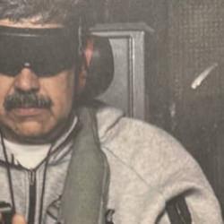 Maduro'nun ka&ccedil;ırılmasında 'DEA' detayı: Ajanın &uuml;zerindeki yazı g&ouml;zlerden ka&ccedil;madı