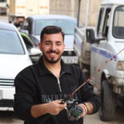 Yer: Adana! Fıkra gibi olayda esnaf sokakta balık tutmaya &ccedil;alıştı