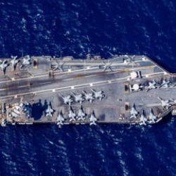 Sıcak saatler! D&uuml;nyanın en b&uuml;y&uuml;k savaş gemisi Girit'ten ayrıldı! 