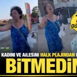 İzmir'de plajda bir kadın baş&ouml;rt&uuml;l&uuml; anne ve kızına s&ouml;zl&uuml; saldırdı