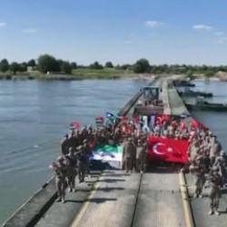 Mehmet&ccedil;ik Fırat'ın iki yakasını katlanabilir k&ouml;pr&uuml;yle birleştirdi