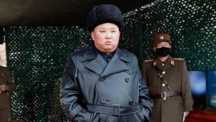 Kim Jong-un, füze ateşlemesini koronavirüse karşı maske takan askerlerle maskesiz izledi