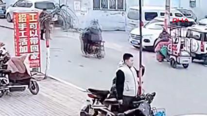 Çin'de dikkat çekmek isteyen gencin direkle imtihanı kamerada