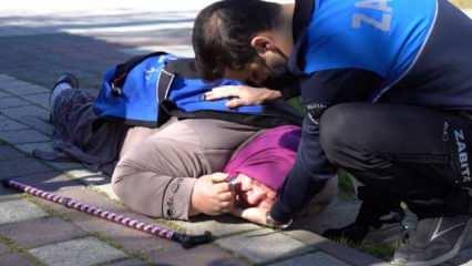 Bursa'da parkta düşen kadına zabıta yetişti! Kadının üstüne montunu serdi, eliyle yastık yaptı