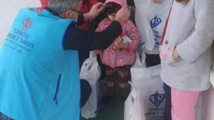 TDV, yetim ve ihtiyaç sahibi çocuklara 40 bin bot ve mont hediye etti