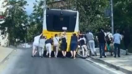 Rampada arıza yapan İETT otobüsünü yolcular böyle itti!