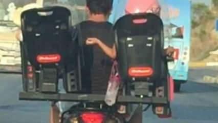 Trafikte akılalmaz görüntü! Çocuklarını böyle taşıdı