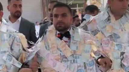 Siirt'te bir düğünde damat paraları taşımakta zorlandı! Arkadaşları yardım etti