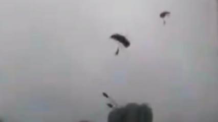Fırtınaya yakalandılar, Moskova'da caddenin ortasına paraşütle indiler