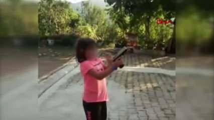 Küçük kıza zorla ateş ettirdi vurulma tehlikesi atlattı