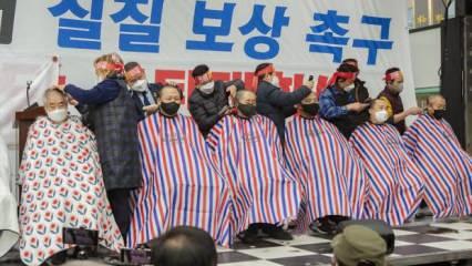 Güney Kore'de koronavirüs kısıtlamalarına saç tıraşlı protesto