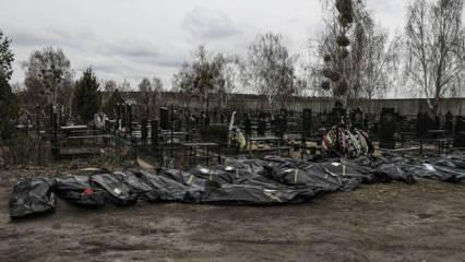 Ukraynalılar, sivillerin cesetlerini toplu mezarlardan çıkarıyor