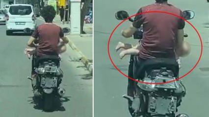 İstanbul'da skandal görüntü! Motosiklet sürerken kucağında bebek taşıdı