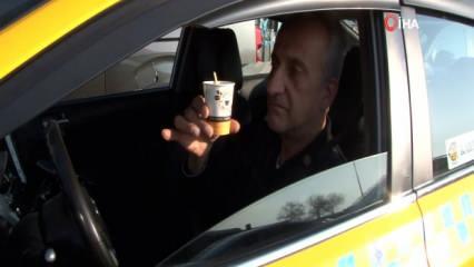 Elinde çay ile araba kullanan taksiciden ilginç savunma
