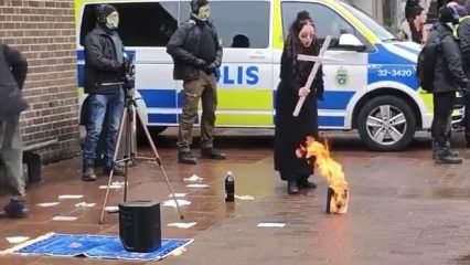 İsveç'te Jade Sandberg isimli bir kadın polis eşliğinde Kur'an-ı Kerim yaktı