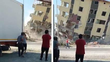 Hatay'da ağır hasarlı bina trafiğe açık yola devrildi