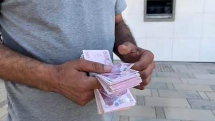 ATM'nin başına gitti! Tomar tomar para buldu...