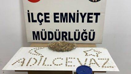Peynir bidonunda 900 altın sikke ele geçirildi