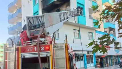 Yangında mahsur kalan 2 çocuk vatandaşların açtığı battaniyeye atlayıp kurtuldu